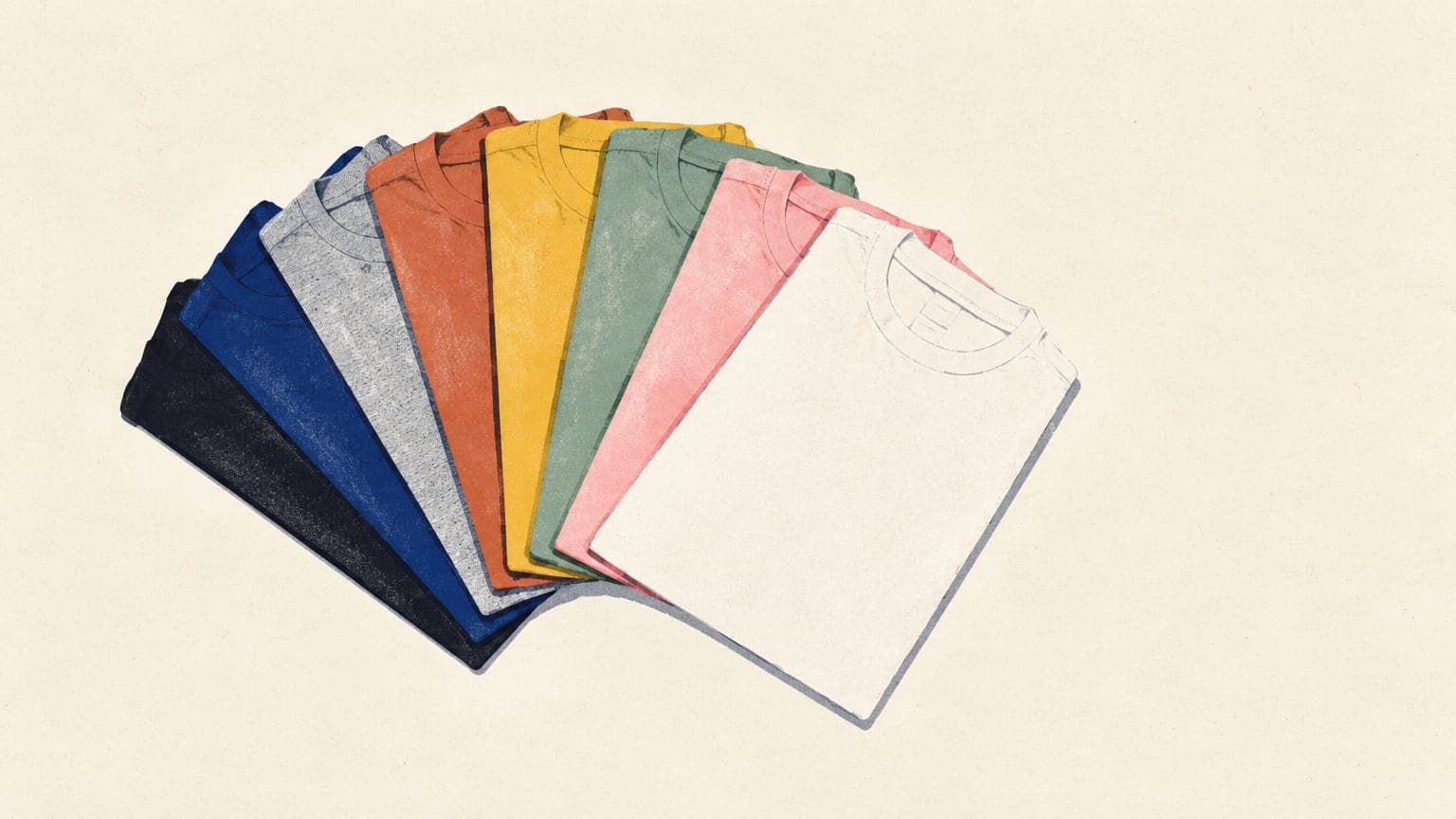 Folded t-shirts fanned out like a color swatch deck, from black and navy through muted colors to white