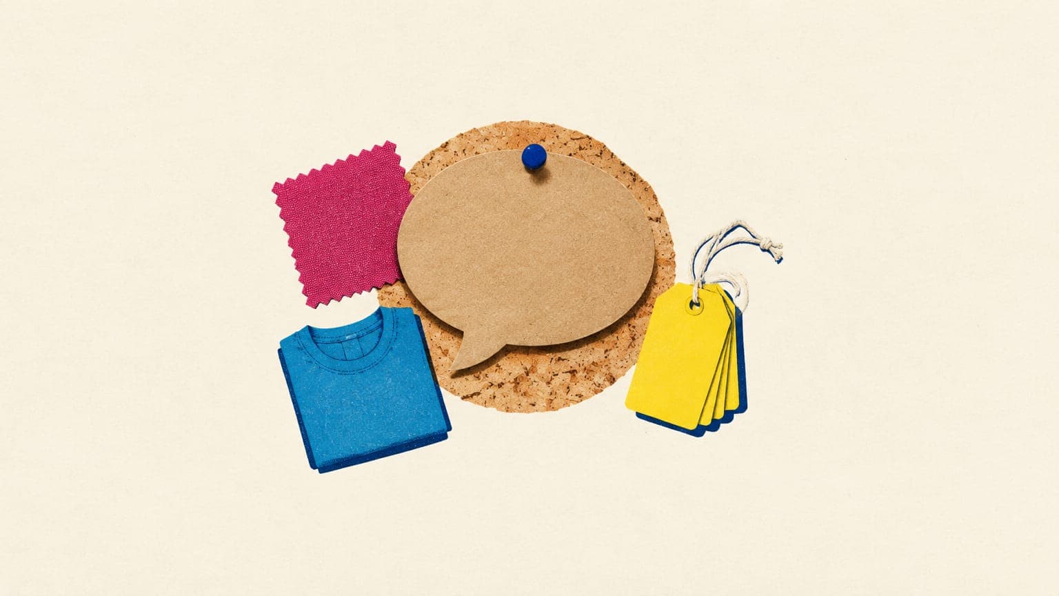Kraft-paper speech bubble pinned to a corkboard beside a folded t-shirt and blank paper price tags