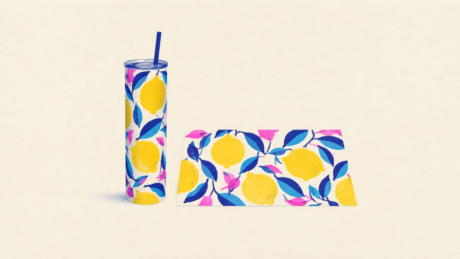 A skinny tumbler standing next to its unrolled patterned wrap lying flat on a table